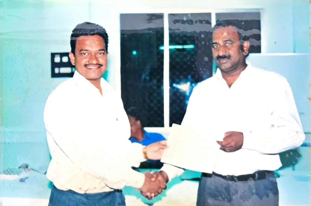 Ganji Krishna Murthy receiving recognition at SCCL Singareni Collieries